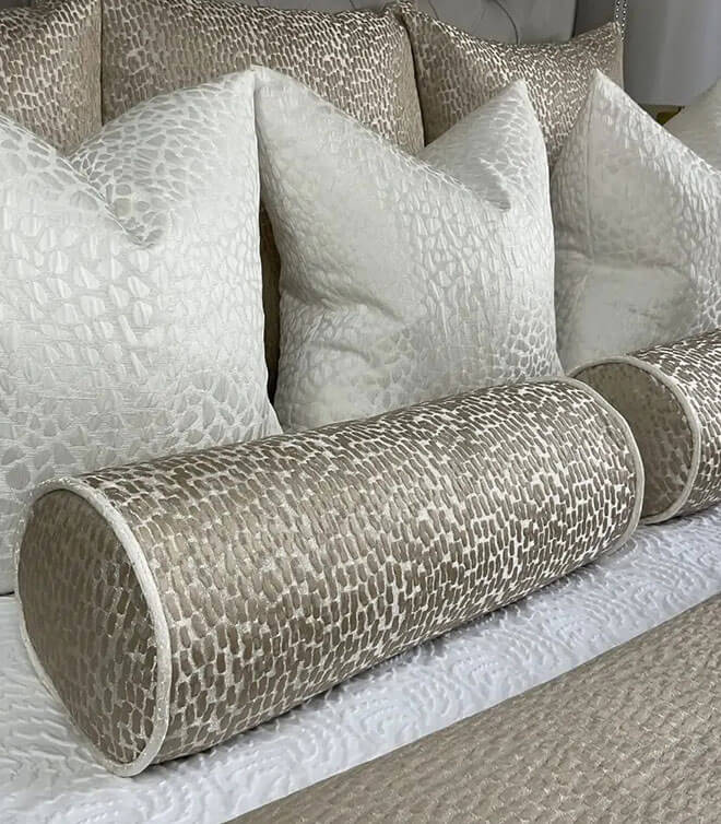 16″ X 6″ Bolster Cushion In Champagne And Gold, Contrasting Ivory Piping