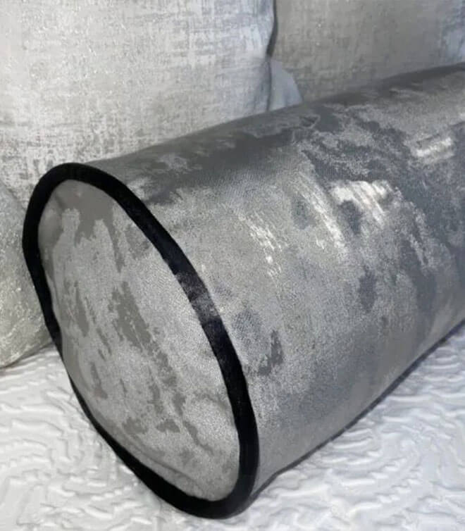 16″ X 6″ PEWTER PIPED BOLSTER CUSHION IN METALLIC GREY