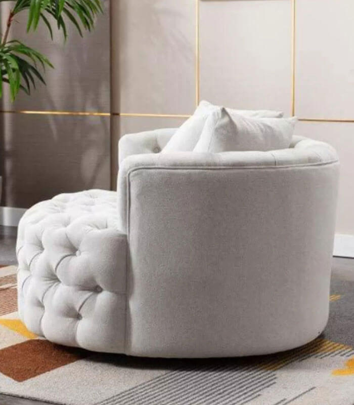 Fully buttoned Tara swivel chairs