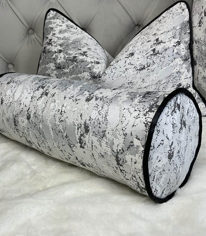 MELLOW MARBLE FEATHER BOLSTER CUSHION 16″X 6″ / CONTRASTING BLACK PIPING