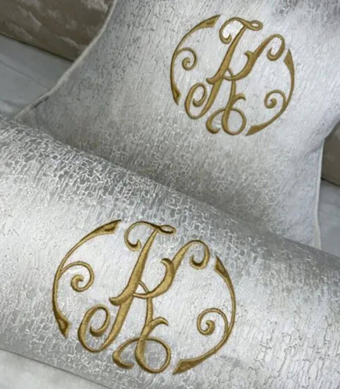 PERSONALISED EMBROIDERED BOLSTER CUSHION 16″ X 6″ IVORY CONTRASTING GOLD PIPING